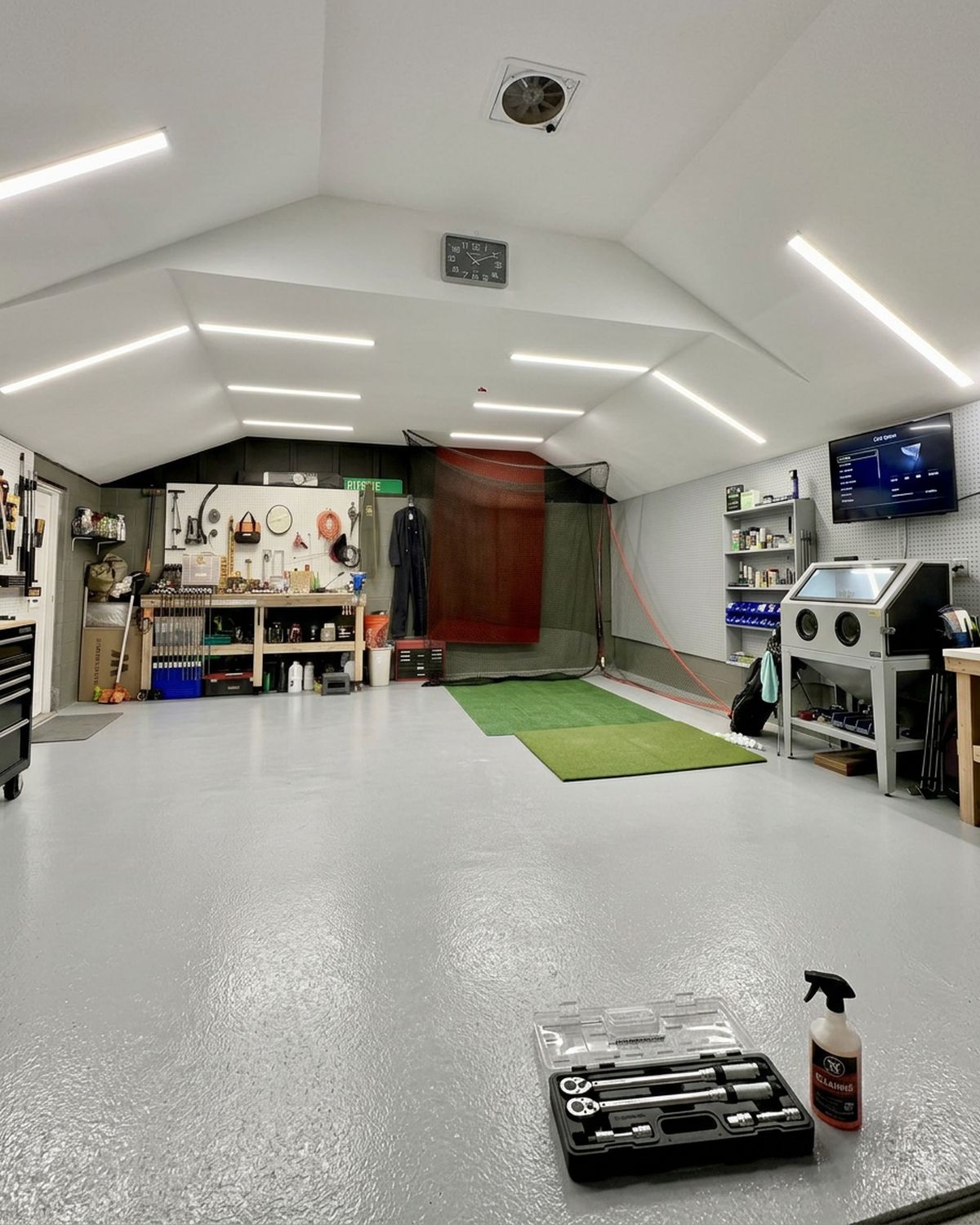 Inside the Chronic Clubworks workshop in Denver, with hitting bay, workbench and club building tools